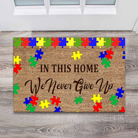 In This Home We Never Give Up - Autism Awareness Coir Pattern Print Doormat