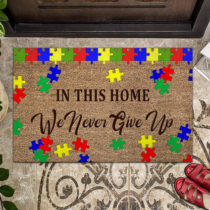 In This Home We Never Give Up - Autism Awareness Coir Pattern Print Doormat